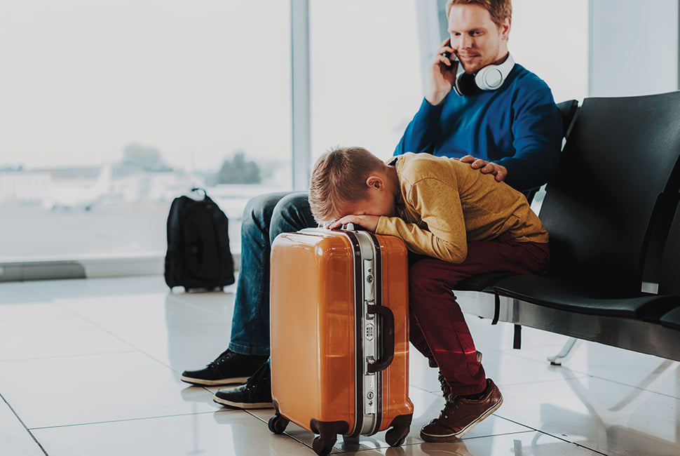 father and child at airport