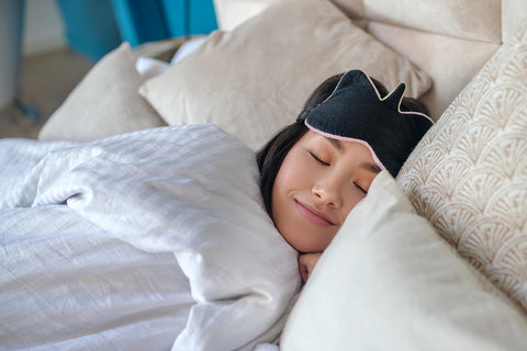 woman lying in bed sleeping