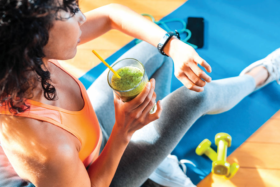 woman enjoying smoothie drink