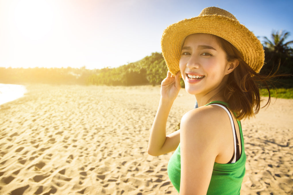 sunshine on woman on beach