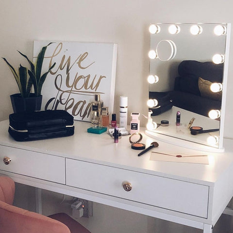 LUXFURNI Starry 7 LED Hollywood Vanity Mirror on a table with cosmetics