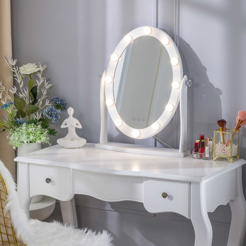 LUXFURNI Starry 8 LED Adjustable Vanity Mirror on a table with cosmetics