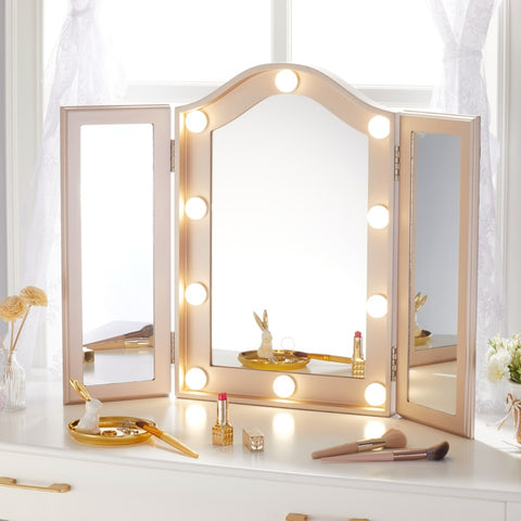 LUXFURNI Starry 5 Tri Fold Hollywood Vanity Mirror on a table