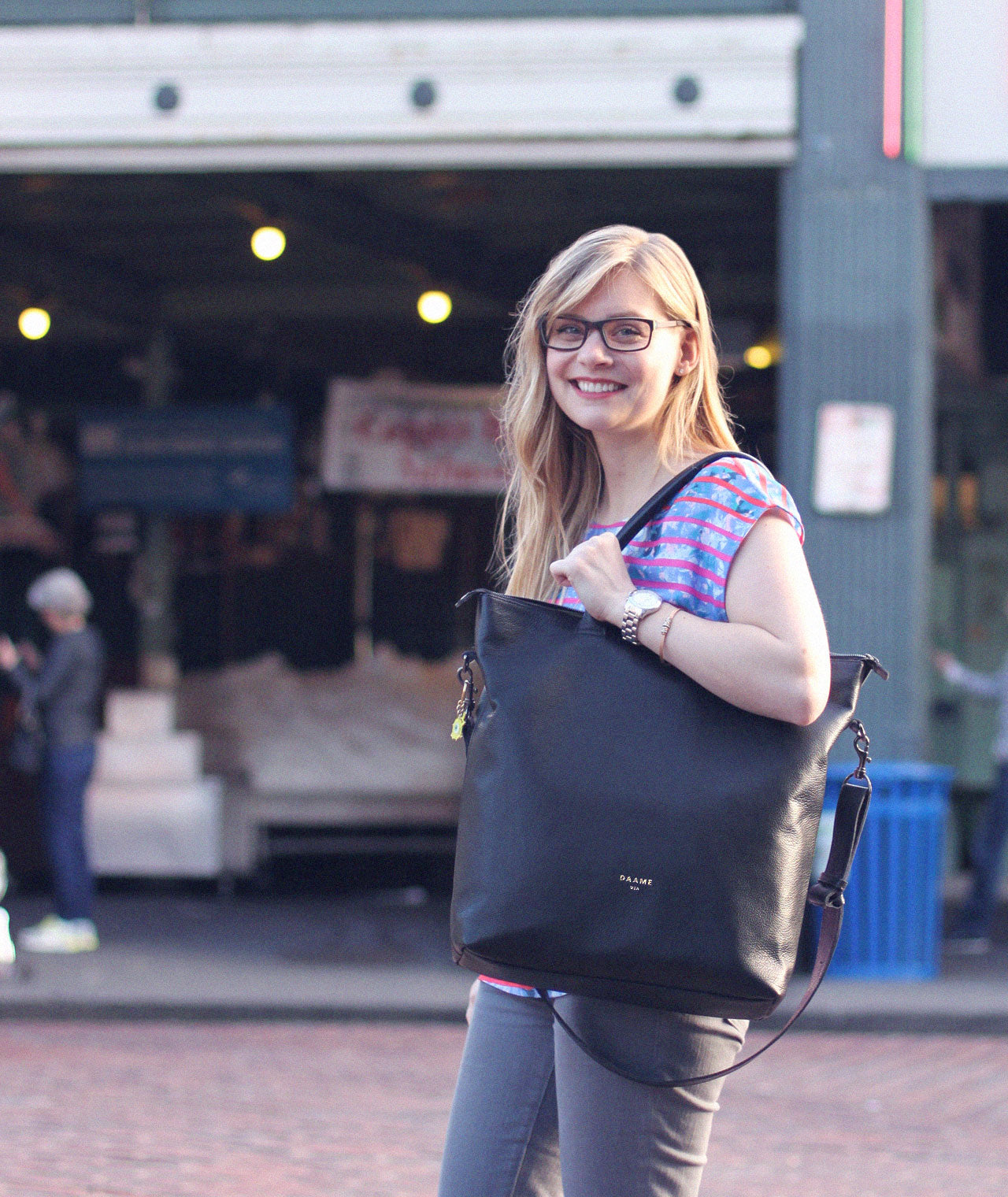 Cover of Brittany styling the DAAME leather laptop tote