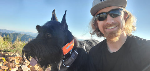 Alex, EXPED Finance Specialist, with his dog Zeela