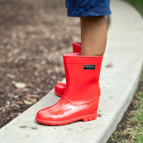 Kid in red rainboots