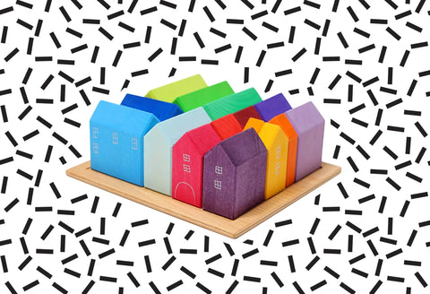 Rainbow wood toy houses with a black and white back ground