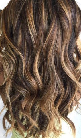 wavy curly hair extensions brown and blonde highlight hair extensions