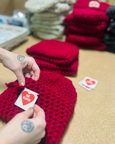 Putting custom patches on fundraiser hats