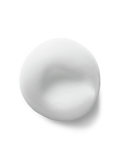 A daub of ILIA’s foaming facial cleanser against a white background.