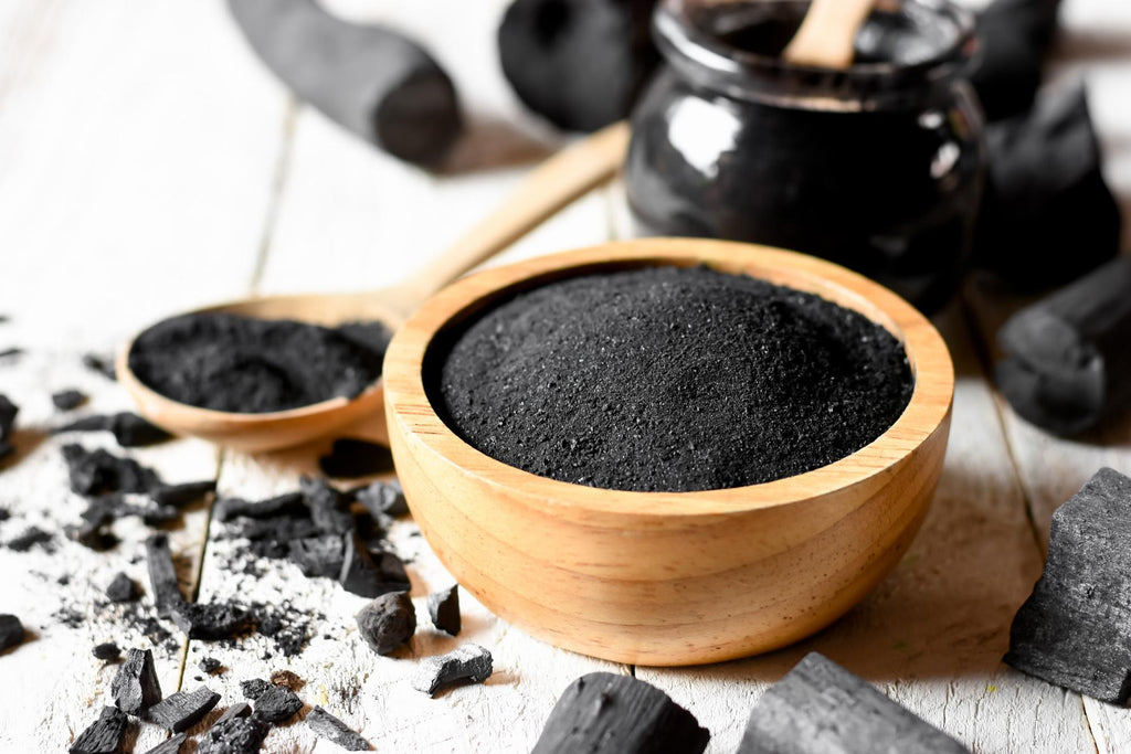 Activated charcoal benefits: charcoal in a bowl
