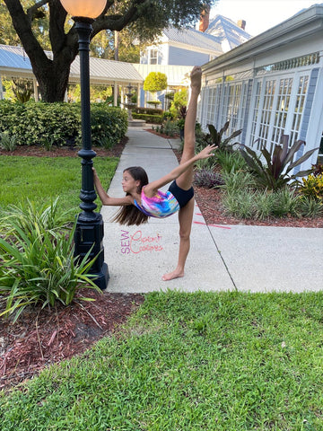 sewcc ambassador camryn modeling her faith leotard