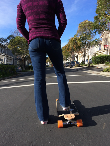 longboarder on street