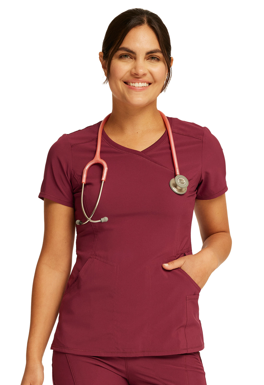 Nurse scrub top from the Infinity Cherokee range in Frosted Rose Heather. Round neck, rib-inset at front, shoulder yokes, front and back princess seams.  