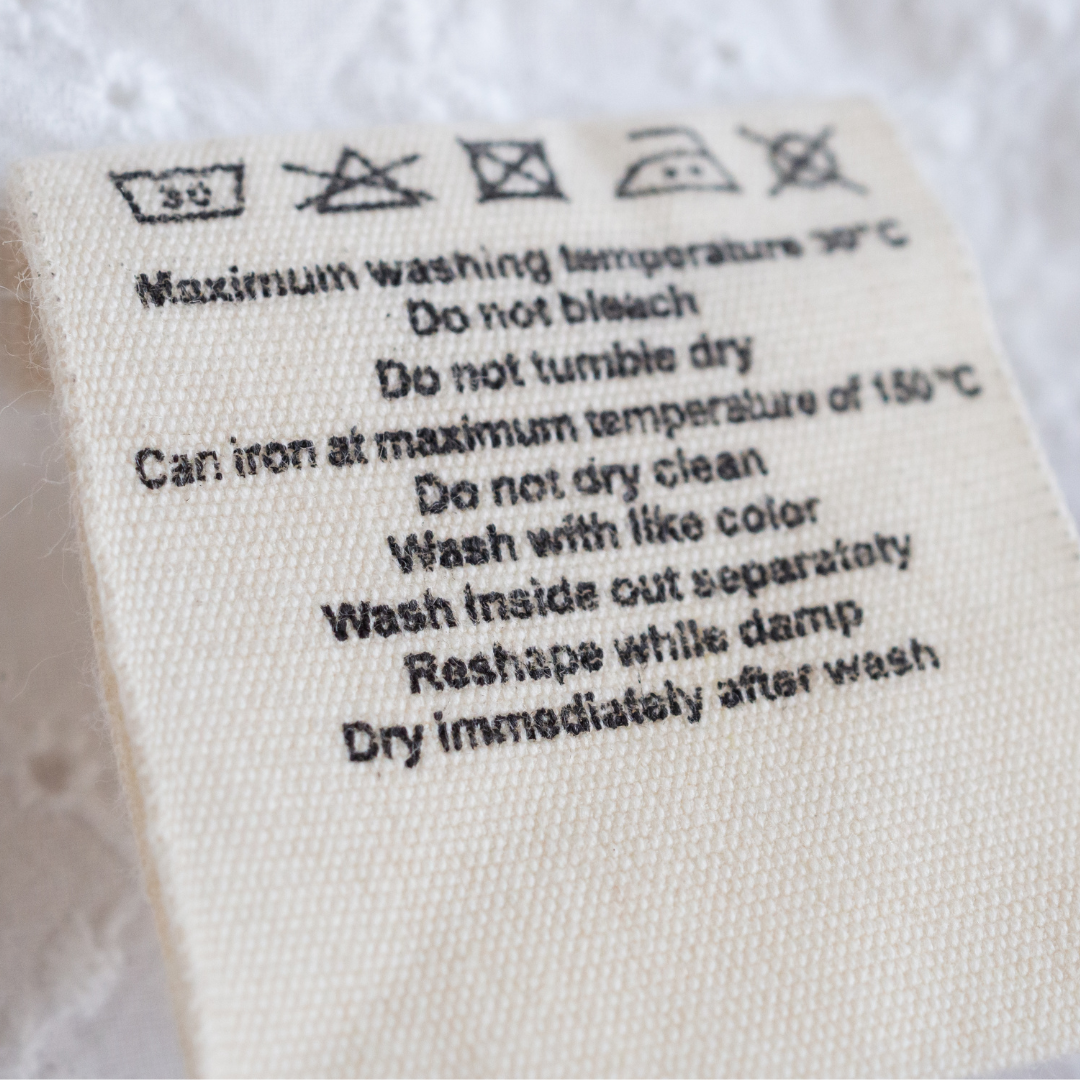 Care label on garment showing how best to launder a garment