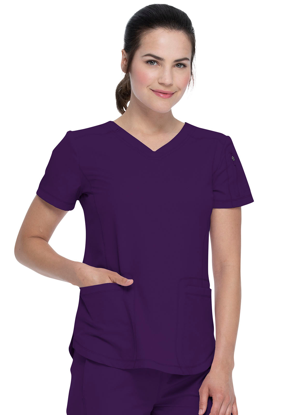 Dickies Dynamix Nurse Scrub Top is made from a high tech poly-spandex fabric blend contructed in a lightweight dobby fabric.  It has lots of pockets to fit all those nursing tools and tech. It is designed to be form flattering, comfort and maximum and durability.