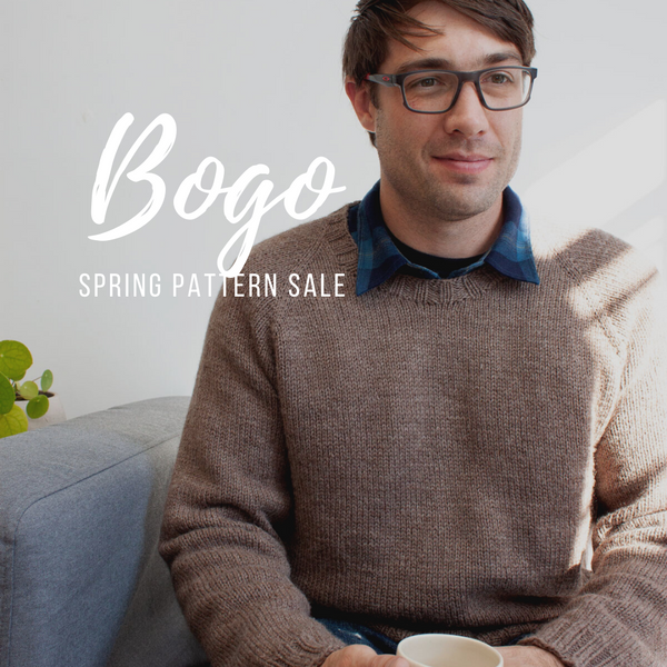 BOGO pattern sale - man in hand knit sweater sitting on a couch wearing glasses holding a coffee cup