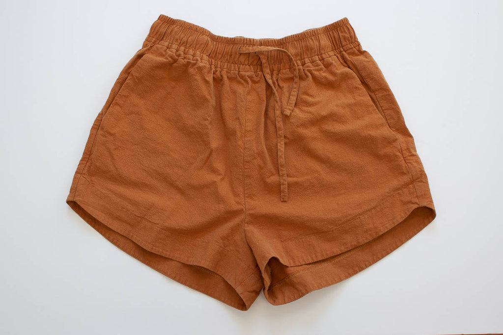 flat lay image of the spring shorts from peppermint magazine sewn in sandwashed cotton in bourbon 