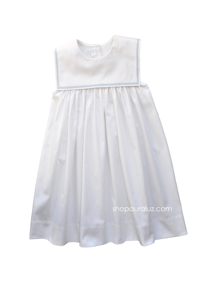 white dress with blue ribbon