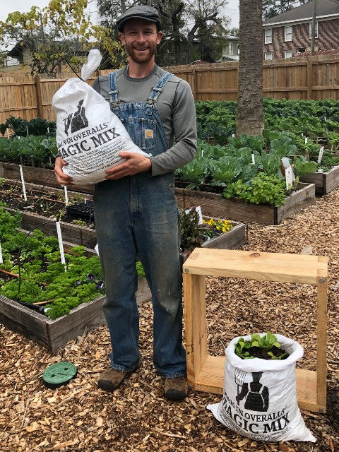 @ManInOveralls, our founder, holding a bag of Overalls Magic Mix at Overalls Farm