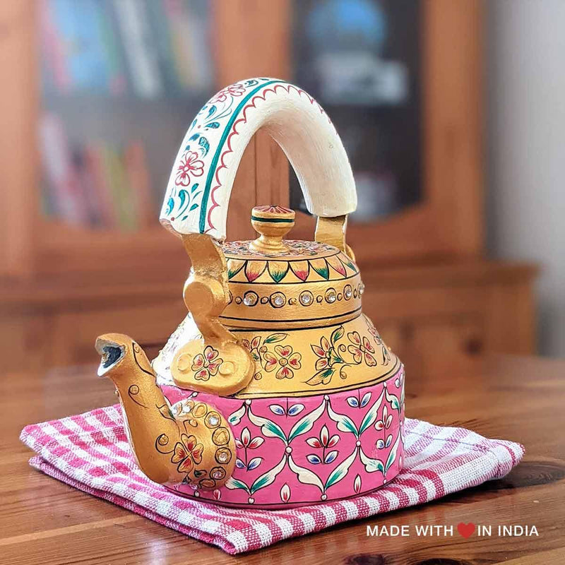 https://cdn.shopify.com/s/files/1/0128/2726/3066/products/sitabo-hand-painted-chai-kettle-teapot-in-pink-white-collectiontitle-151082_800x.jpg?v=1621203305