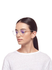 Blue Light Glasses from The Book Club displayed on a model