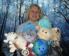 Noreen Grice holds several Celestial Buddies plush planet pals in front of a virtual forest background