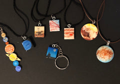 Various necklaces with planetary science themes