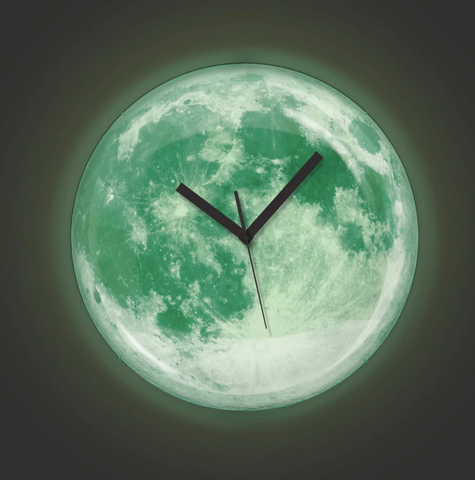 A glow in the dark moon clock