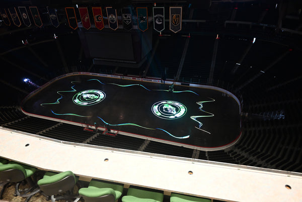 X-Laser systems projecting onto the rink at Xcel Energy Center in Minneapolis, MN