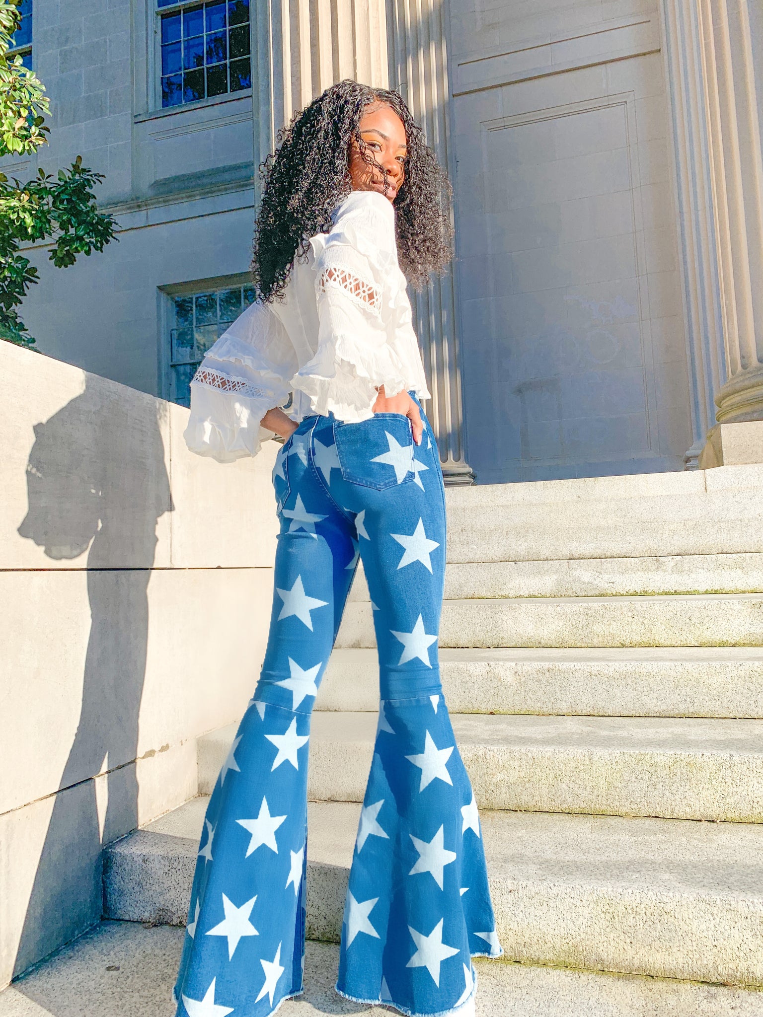 star printed bell bottom jeans