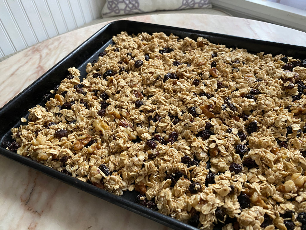 Granola recipe, mixed ingredients on baking sheet