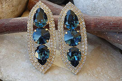 gold and dark blue earrings