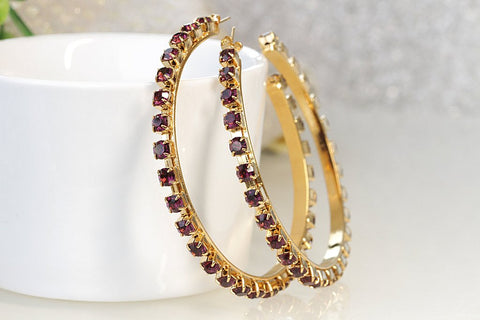 gold and purple earrings