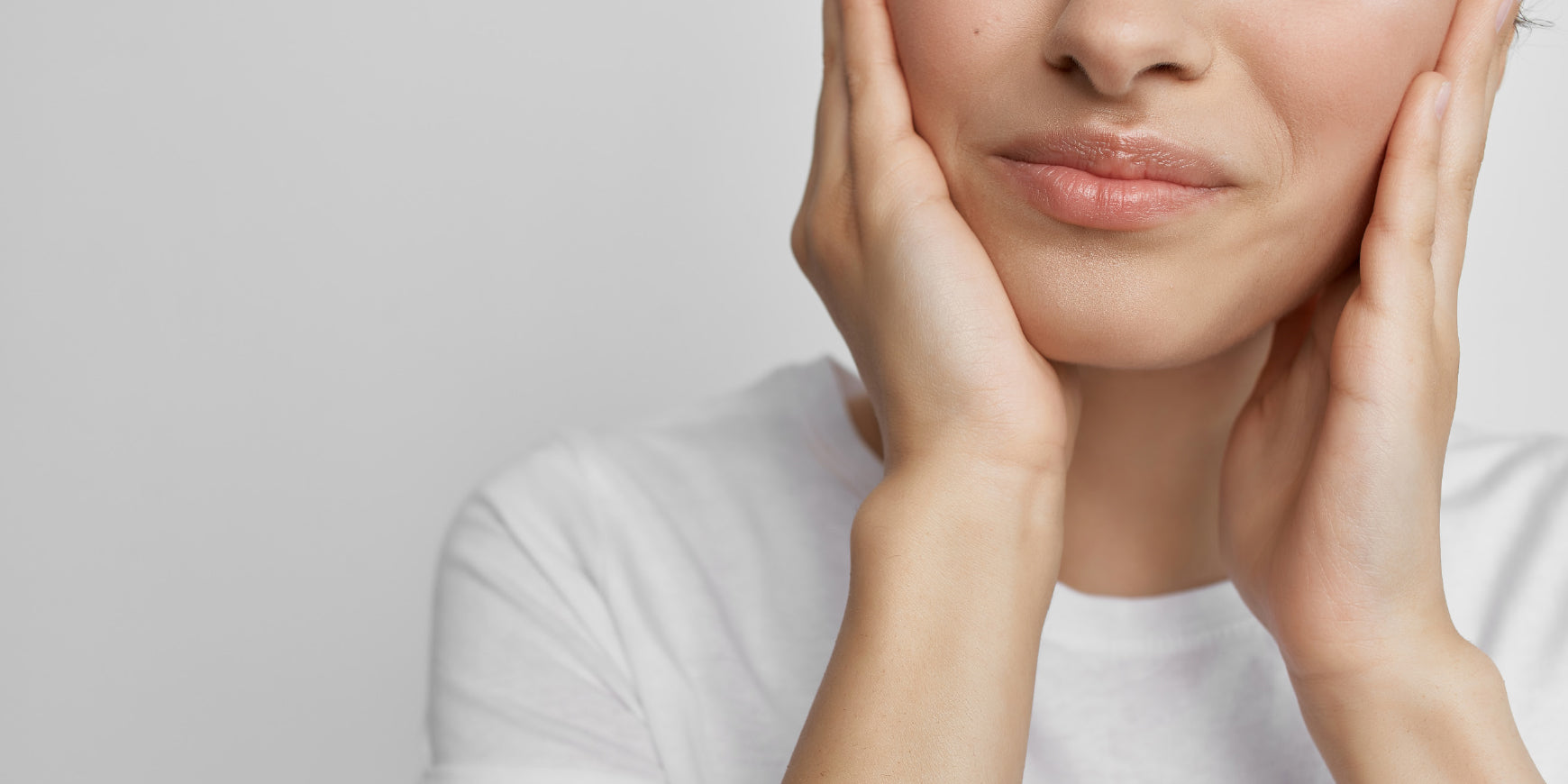 Pained woman touching her jaw