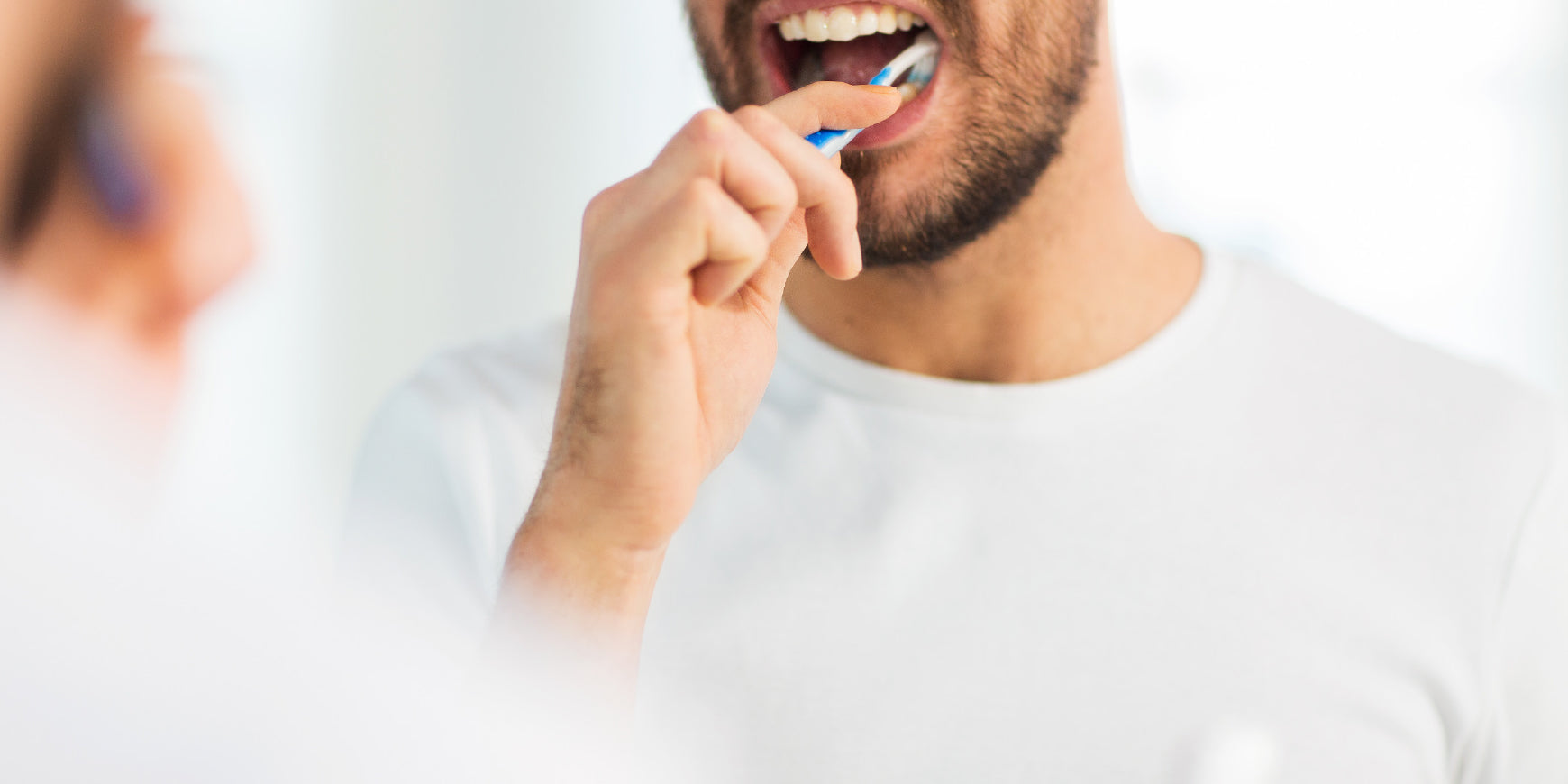 Man brushing his teeth