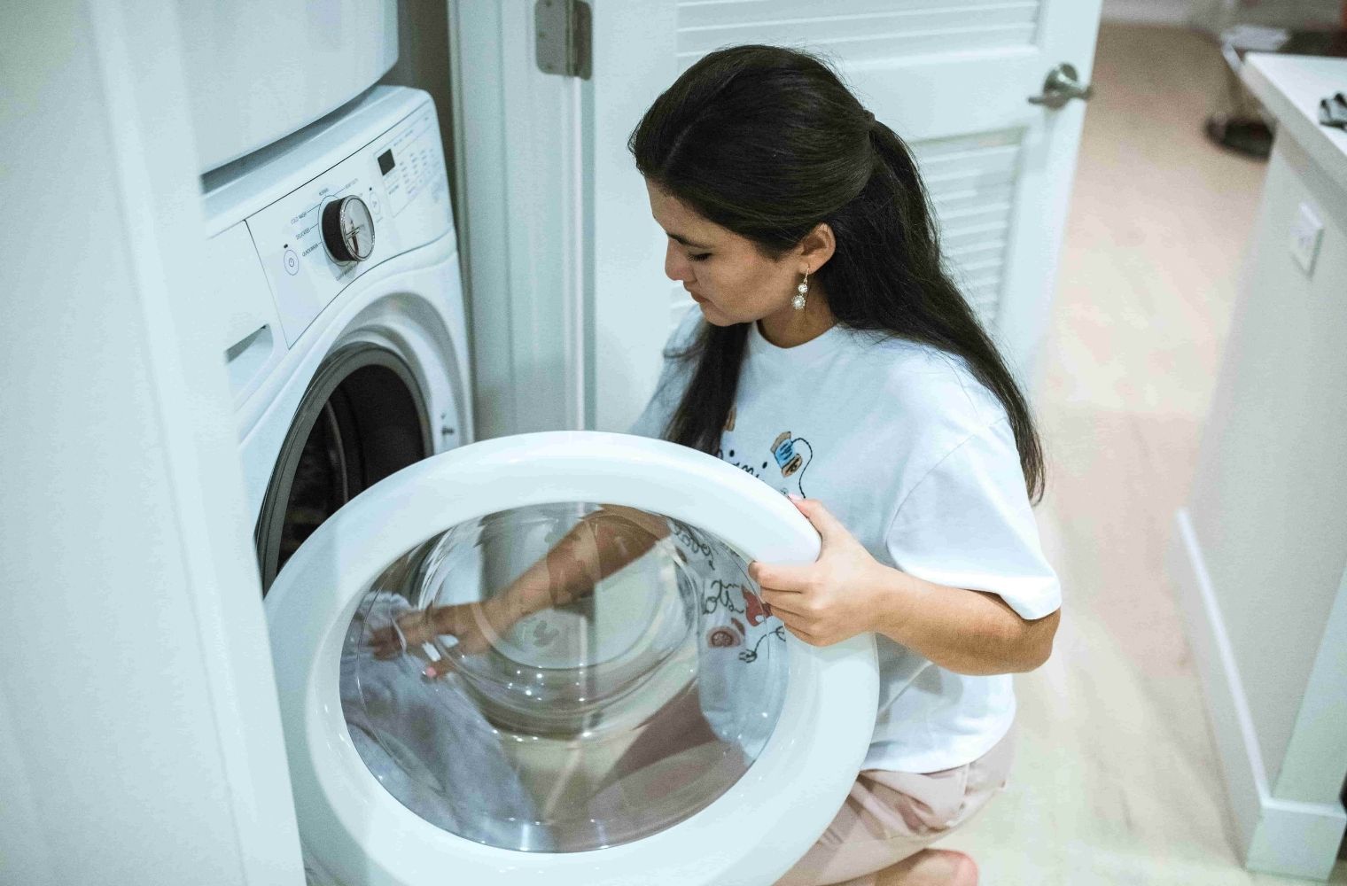 Woman doing a load of laundry