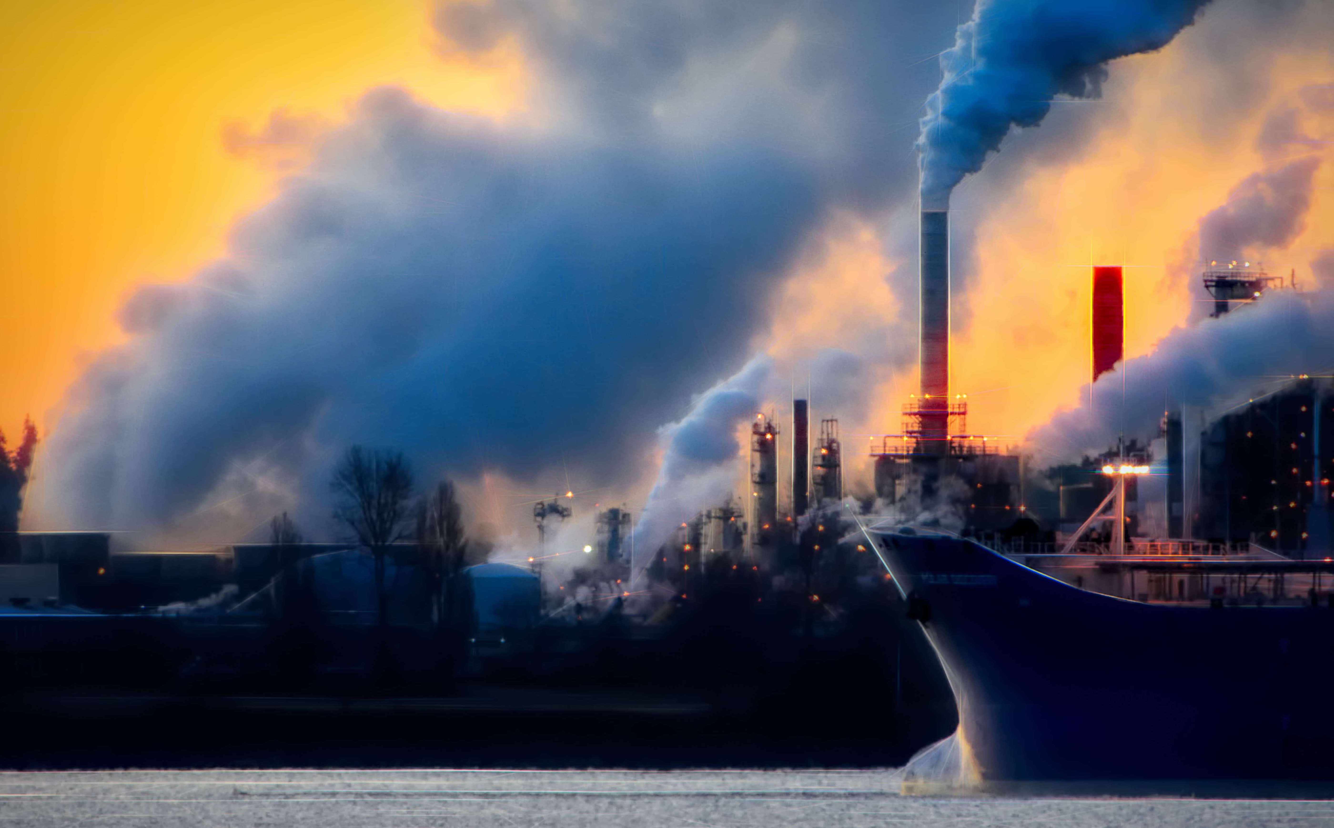 Ships releasing emissions at sea