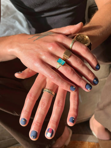 Anne Hathaway's Molten Gold Nails Amped Up the Drama of Her Met