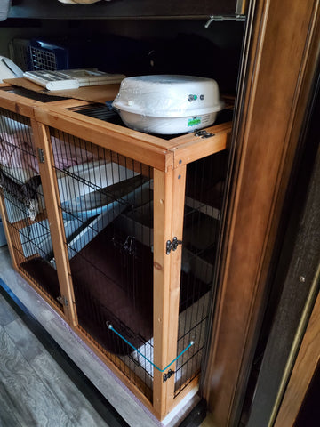 Purrified Air filter on ferret cage in mobile home.