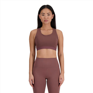 New Balance Sleek Medium Support Sports Bra on model front view