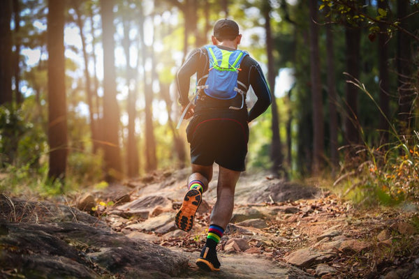 Man runner trail athletes feet wearing