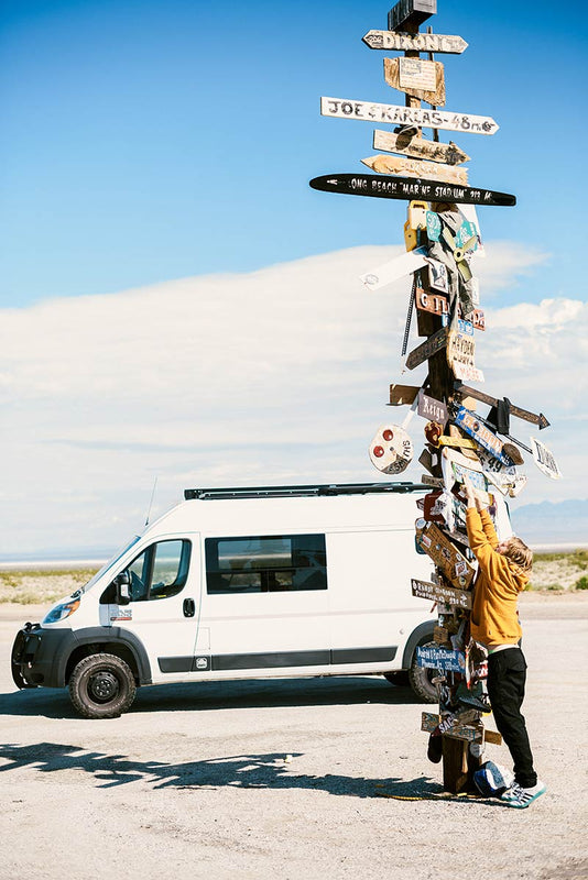 Alec at sign post