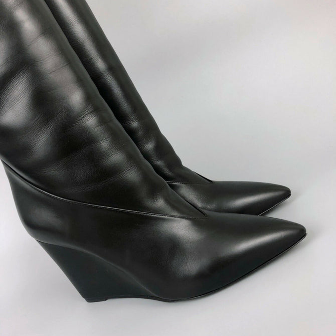 black leather boots with wedge heel