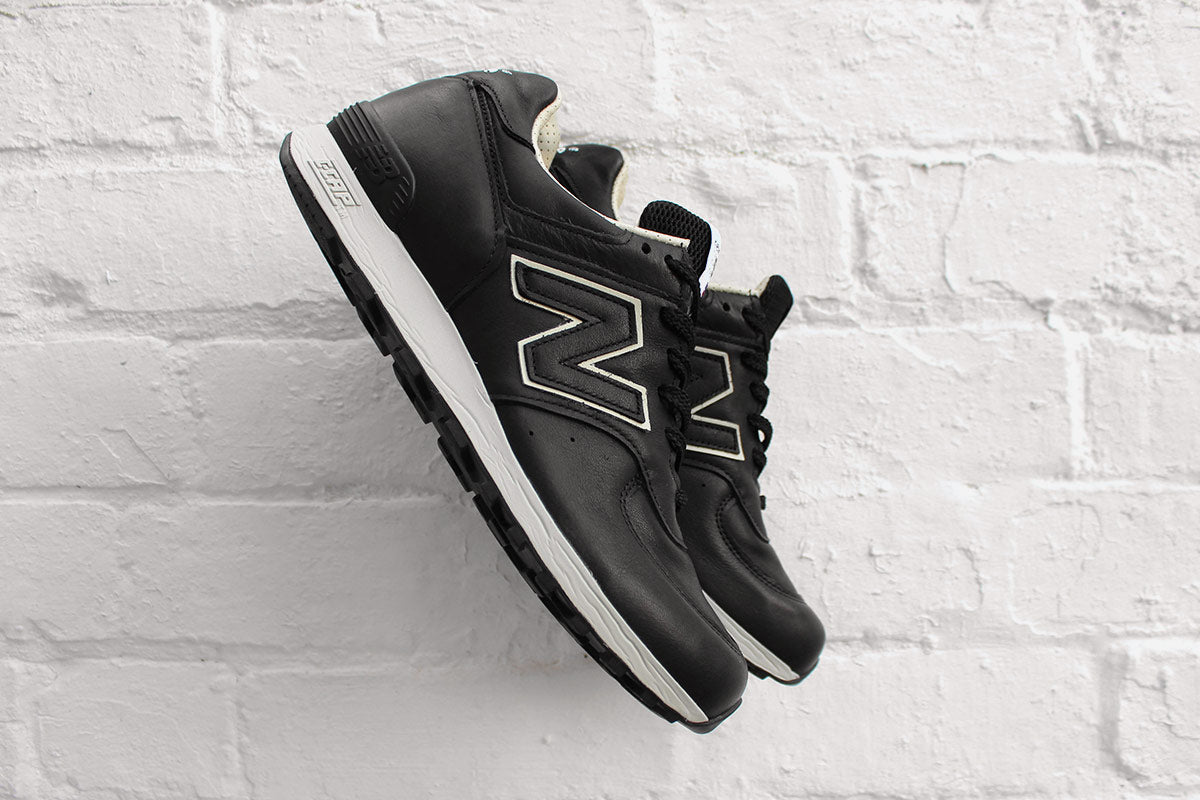 new balance 576 black leather