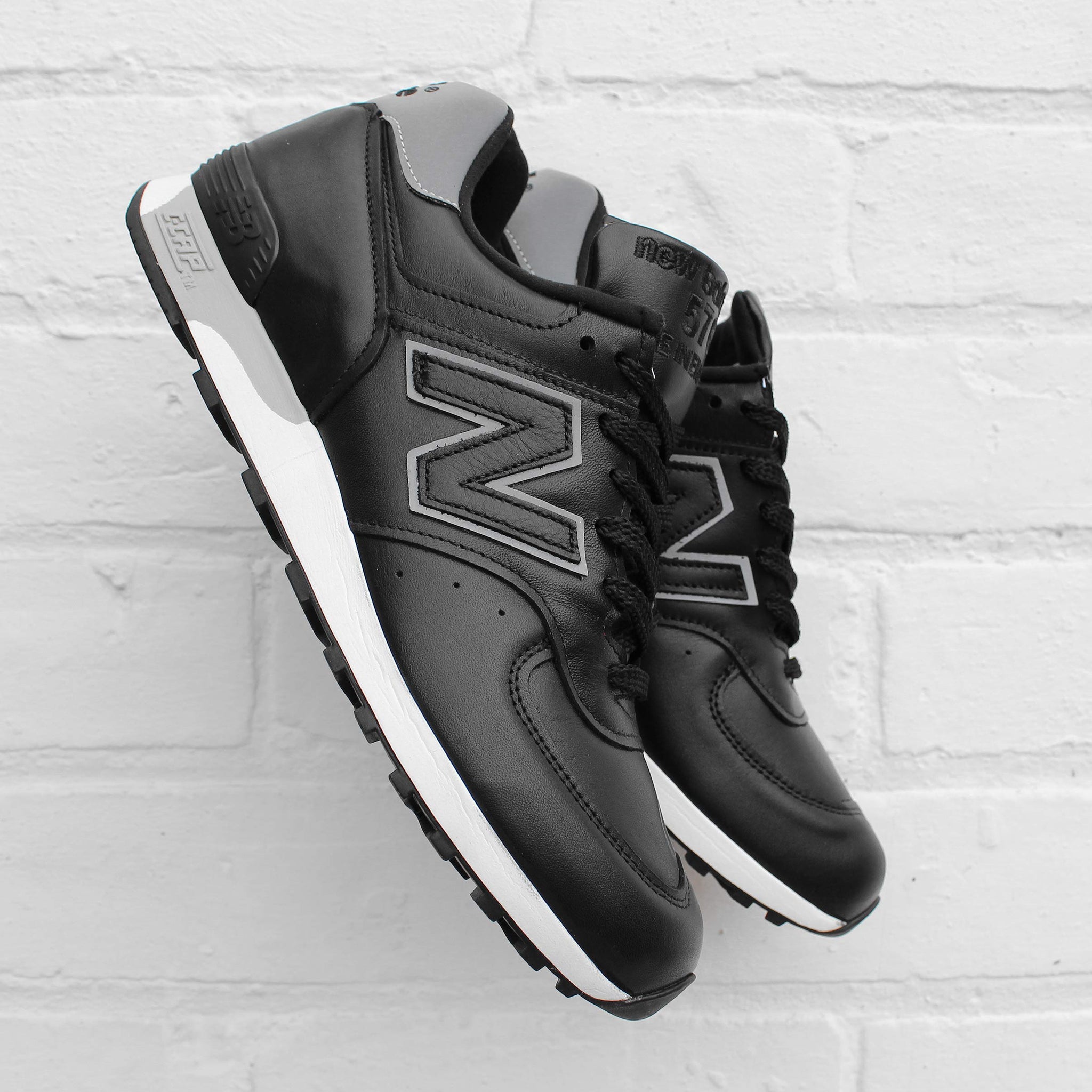 new balance 576 black leather