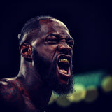 Le boxeur Deontay Wilder criant de rage après sa victoire par KO contre Luis Ortiz