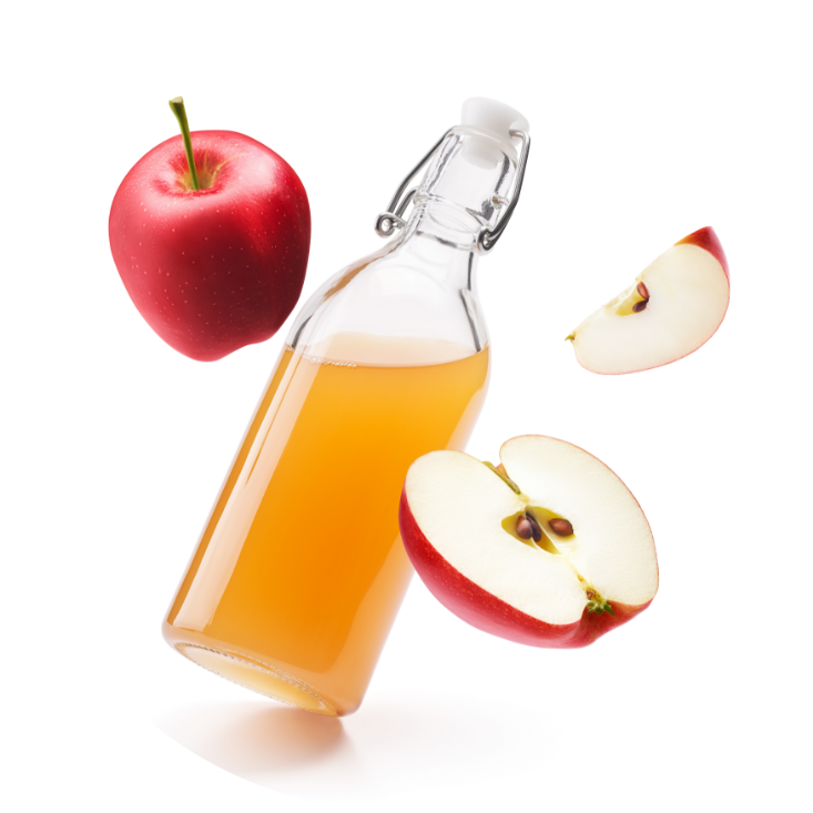 Apples aroung a bottle of Apple cider vinegar