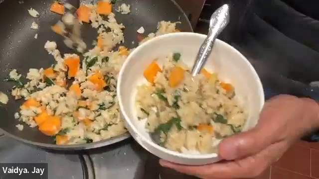 BASIL_BROWN_RICE being prepared in a frying pan