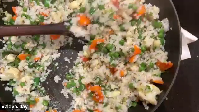 image of millet cumin medley being prepared in a pan